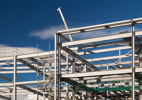 Structural steel frame in a new building construction project