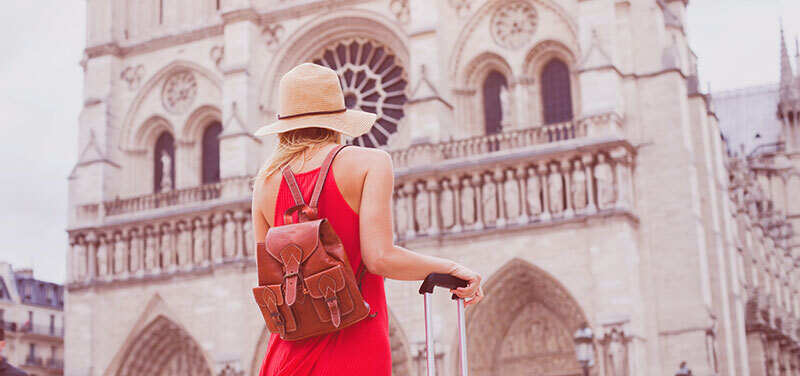 Tourist visiting Notre Dame de Paris