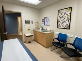 an empty exam room in a pediatric office