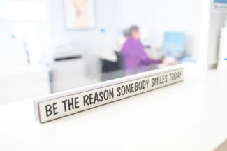 be the reason someone smiles today sign