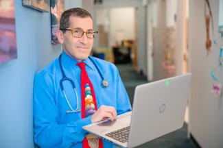 doctor man with laptop