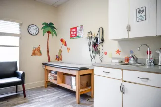 an exciting jungle-themed pediatric exam room