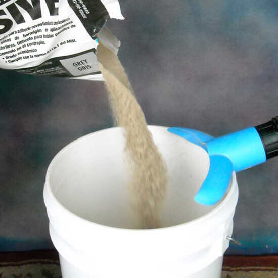 Eliminate dust from mixing mortar and grout in buckets, The WaleTale will not allow dust to escape the top of the bucket
