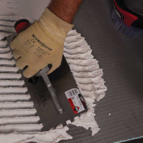 Spreading Thinset on Tile Backerboard with Rubi Trowel
