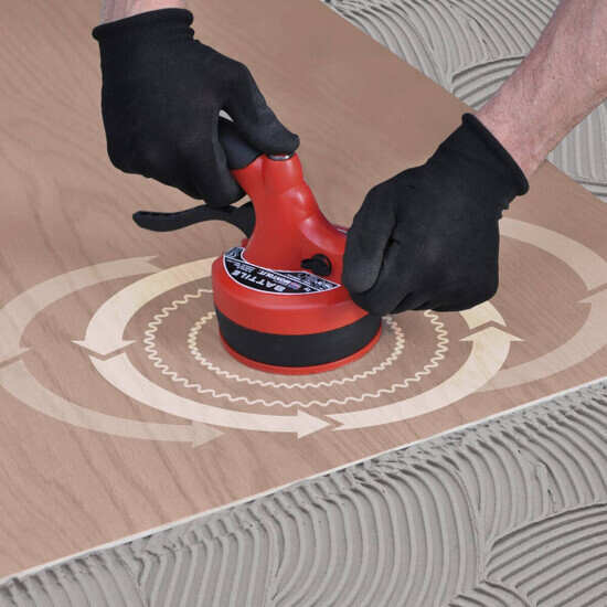 Vibrating Large Format Tile into Thinset Adhesive