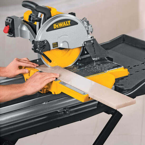 Dewalt Tile Saw cutting tile with extension table