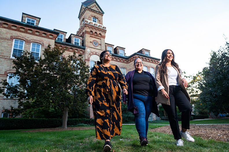 Students walking in front of Old Main