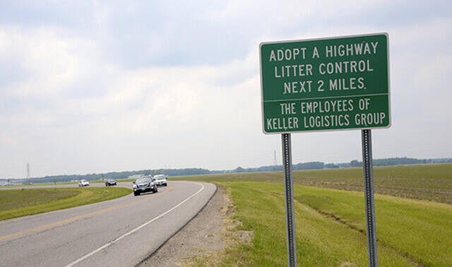 Adopt A Highway sign on Elliott Road in Defiance Ohio near Keller Logistics Group Headquarters 