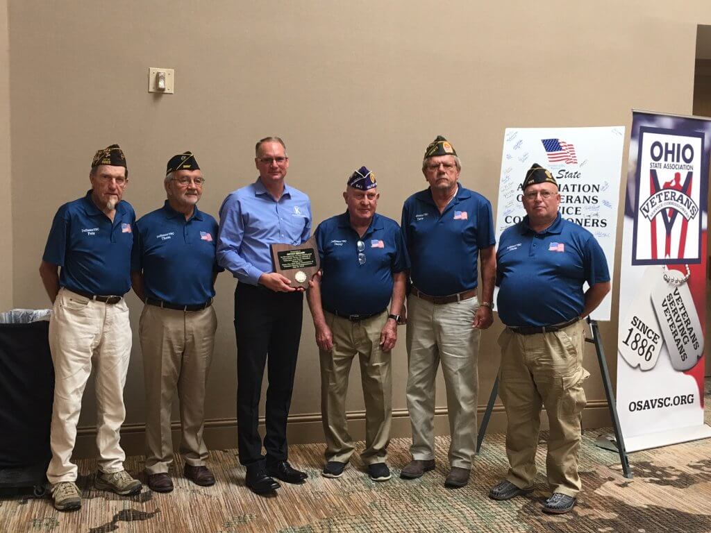 Bryan Keller receives Veterans Commissioners Award.
Pictured Left to Right: Peter Kenner, Thomas Kent, Bryan Keller, Darcy Lehman, Dave Lulfs, and Chris Newton.