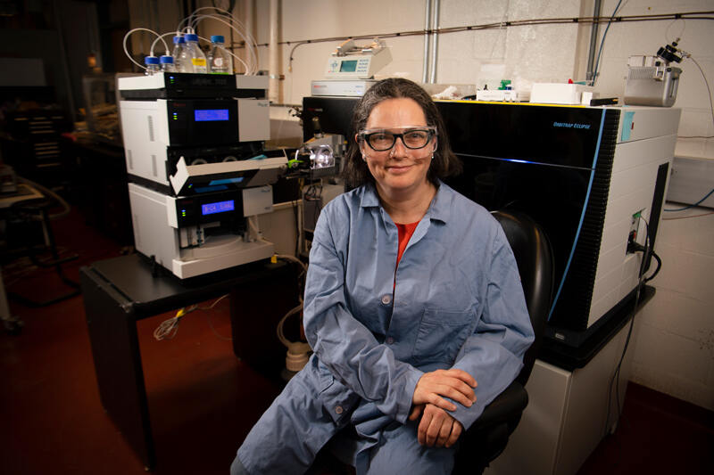 Sharon Rozovsky, University of Delaware associate professor of chemistry and biochemistry, with the new mass spectrometer in Brown Laboratory.