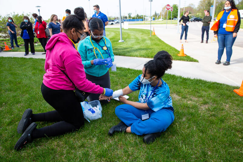 Brandywine Middle School students, who are part of the Lifesavers program, serve as both victims and caretakers in a disaster simulation on UD’s STAR Campus.