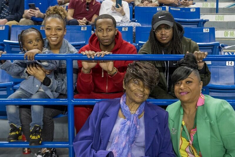 The cheering section for Chanel Gaither, who earned her doctorate in educational leadership, included (back row, left to right) her 4-year-old nephew, Gage, his mother, Gina, Chanel’s brothers Dyshaun and Lamar, and in the front row Chanel’s grandmother, Clara Gaither, and mother, Tawana Gaither.