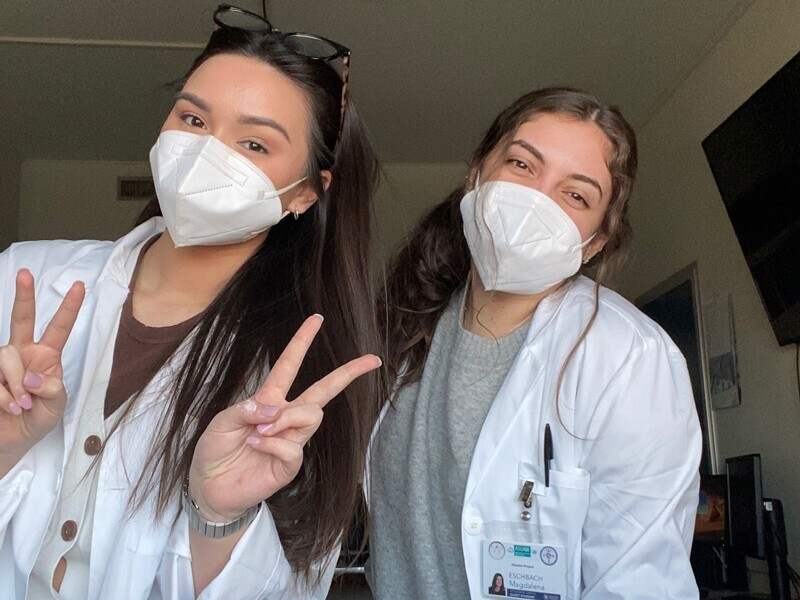Biomedical engineering major Valarie West (left) and Magdalena Eschbach, a medical diagnostics major with a pre-physician assistant concentration, round with local clinicians at San Martino Hospital in Genoa, Italy. 