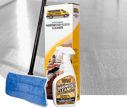 Stanley Steemer hardwood floor cleaning maintenance kit with hardwood cleaner spray and mop.