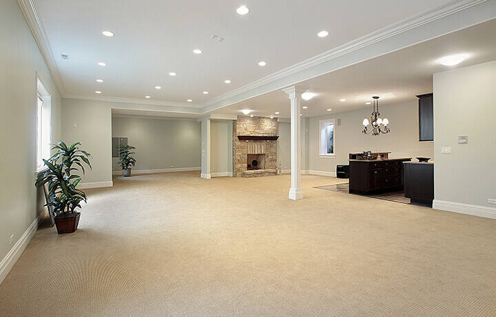 Empty basement featuring carpet