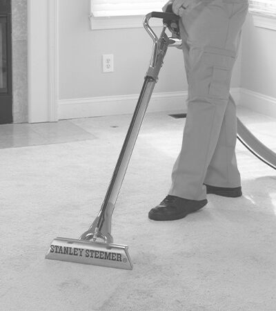 Stanley Steemer cleaning carpet of an empty home for sale