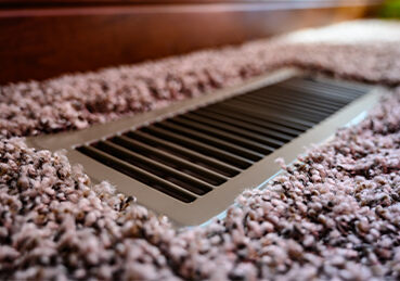 Clean vent on carpeted floor