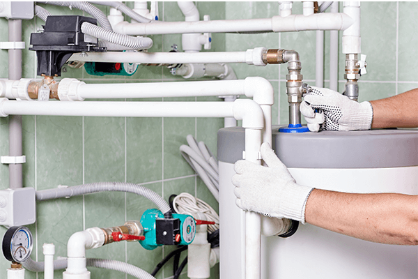 Pipes that lead to water heater in home