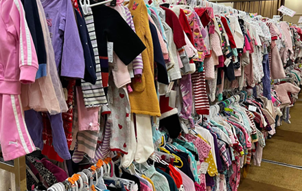 A large selection of children's clothing displayed in Cape Kid's Treasures.