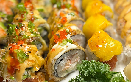 A tray of 3 different maki sushi rolls sold by Maki Sushi Bar & Grill.