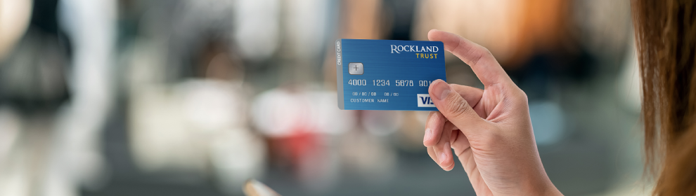 woman holding Rockland Trust consumer credit card