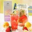 Strawberry Lemonade Fruit Infusion lifestyle with drink in front