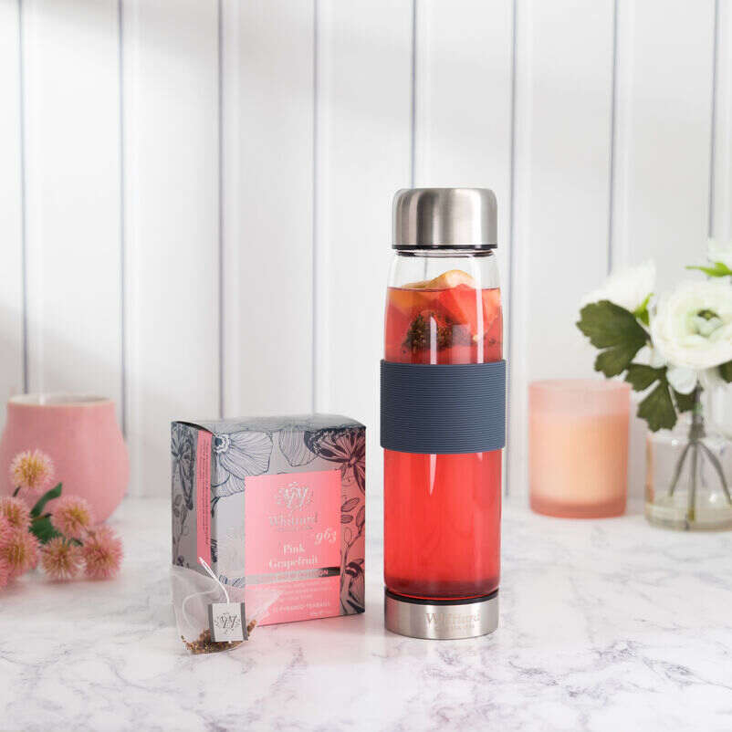 Cold Brew Pink Grapefruit Teabags Box with suvi bottle lifestyle