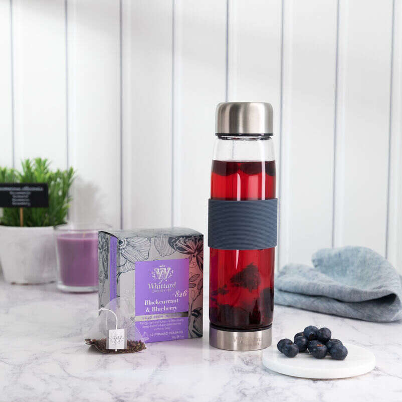 Cold Brew Blackcurrant & Blueberry Teabags Box with suvi bottle lifestyle