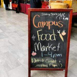 This is a picture of the campus food market sign. 