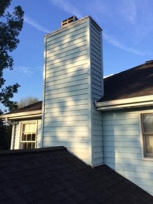 How to Repair Holes in Vinyl Siding — Signature Exteriors - A St. Charles  and St. Louis Roofing Contractor