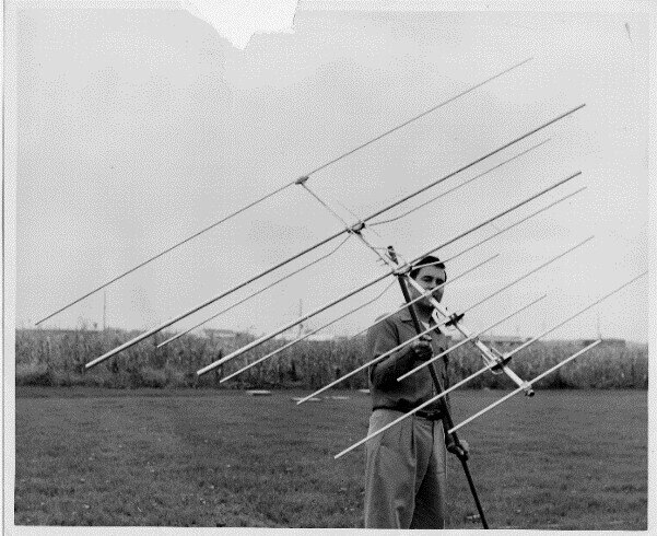 John Winegard, founder and member of the Consumer Electronics Assoc. Hall of Fame, with one of the first multi-channel Yagi antennas he invented