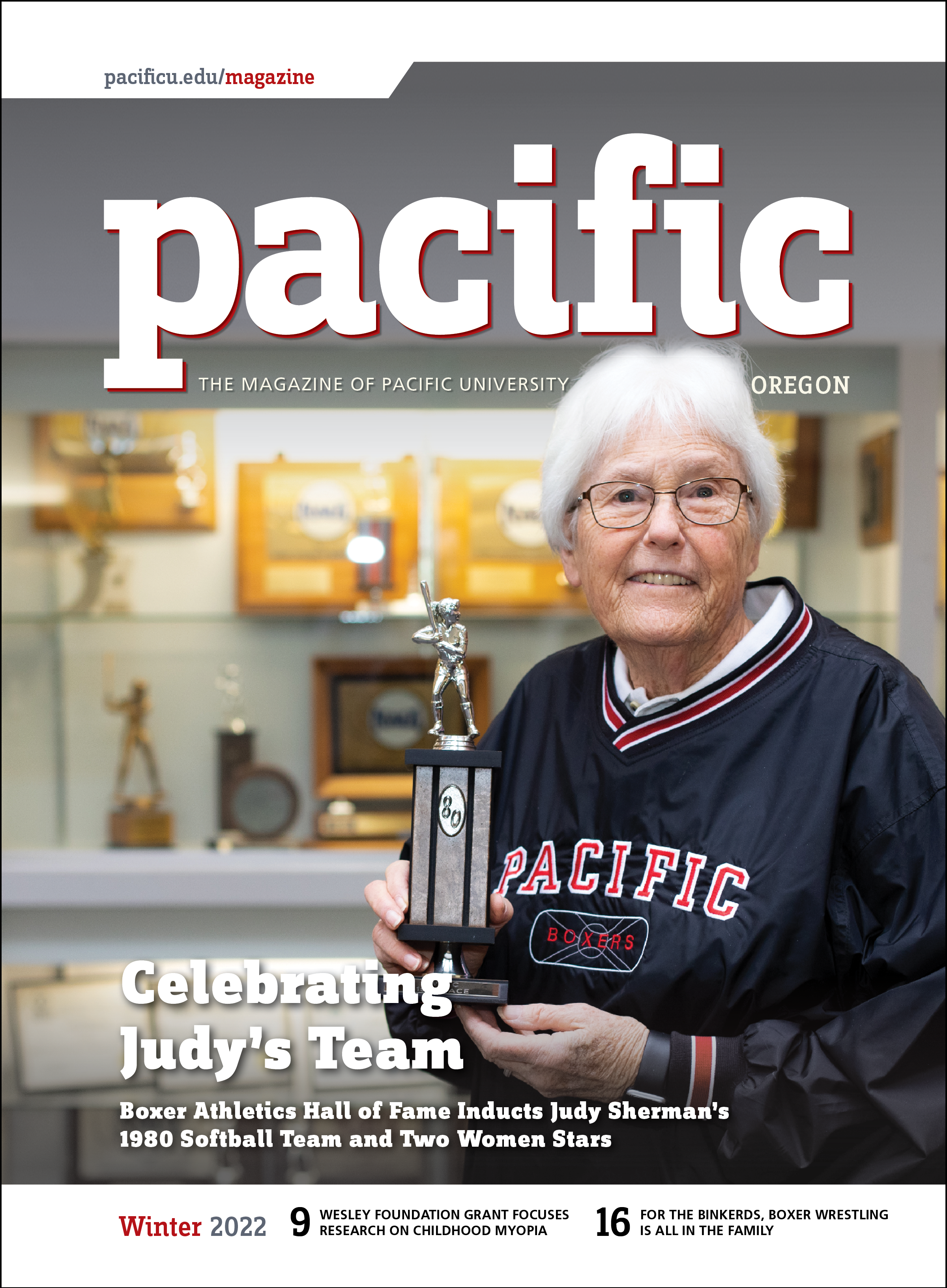 cover of winter 2022 pacific magazine, alumna holding trophy