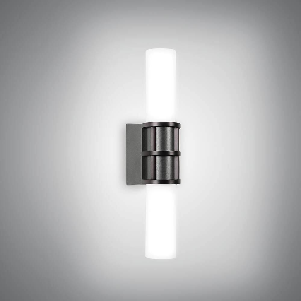 A small cylindrical sconce with a center trim