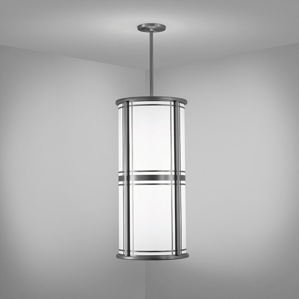 A classic architectural cylinder pendant with frame accents 