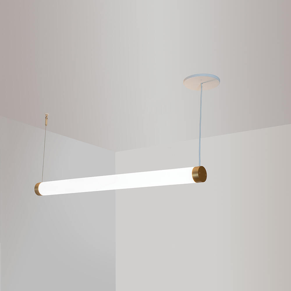 A thin, long, luminous cylinder pendant hung horizontally with cables