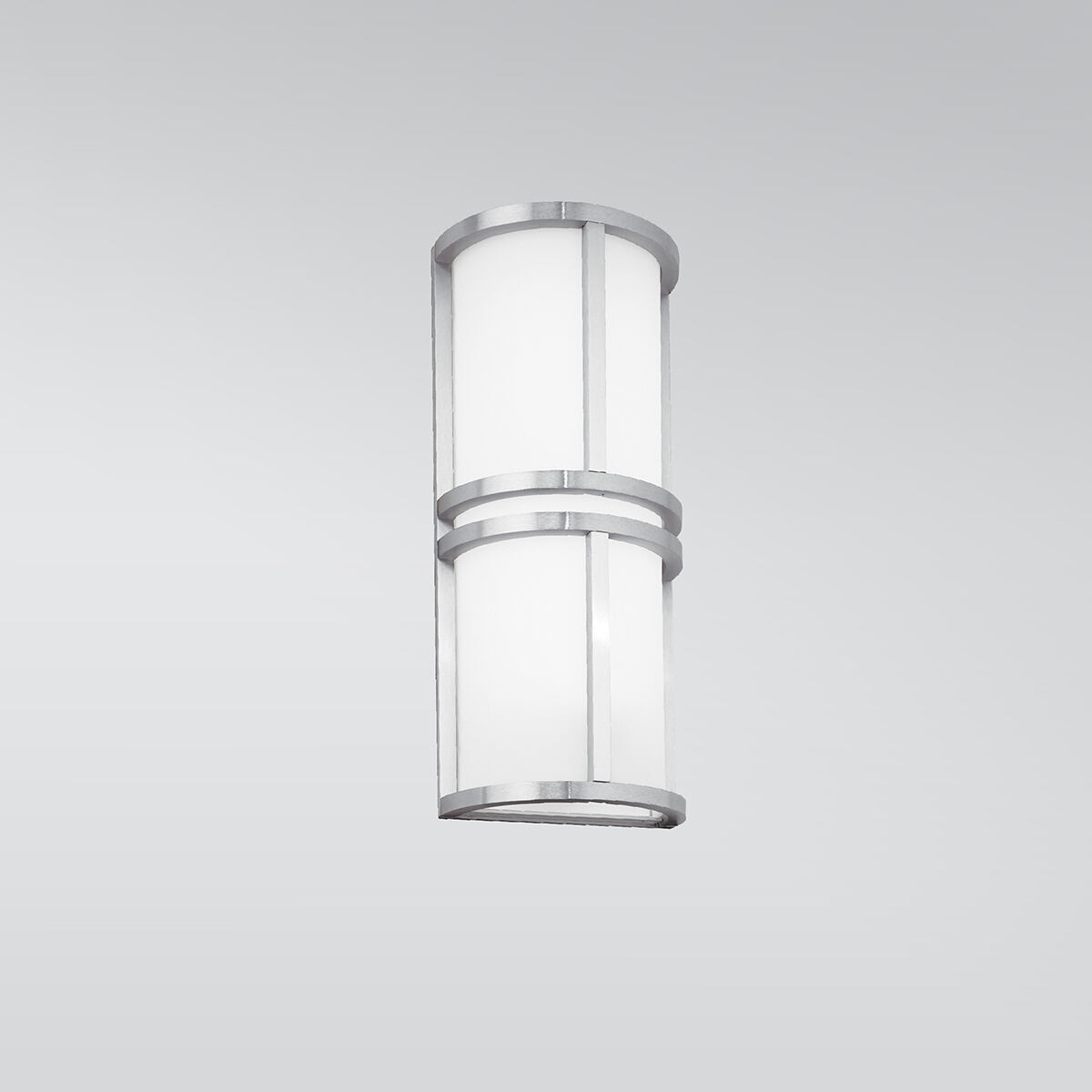 A rectangular indoor wall sconce with center bar accents