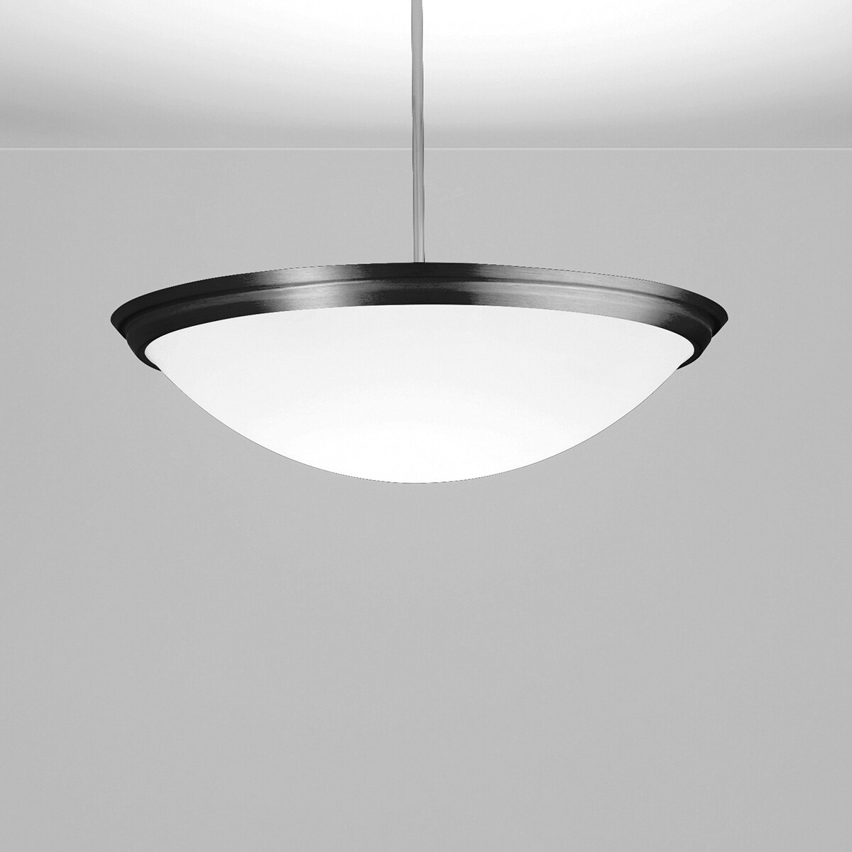 A large bowl pendant suspended with a stem