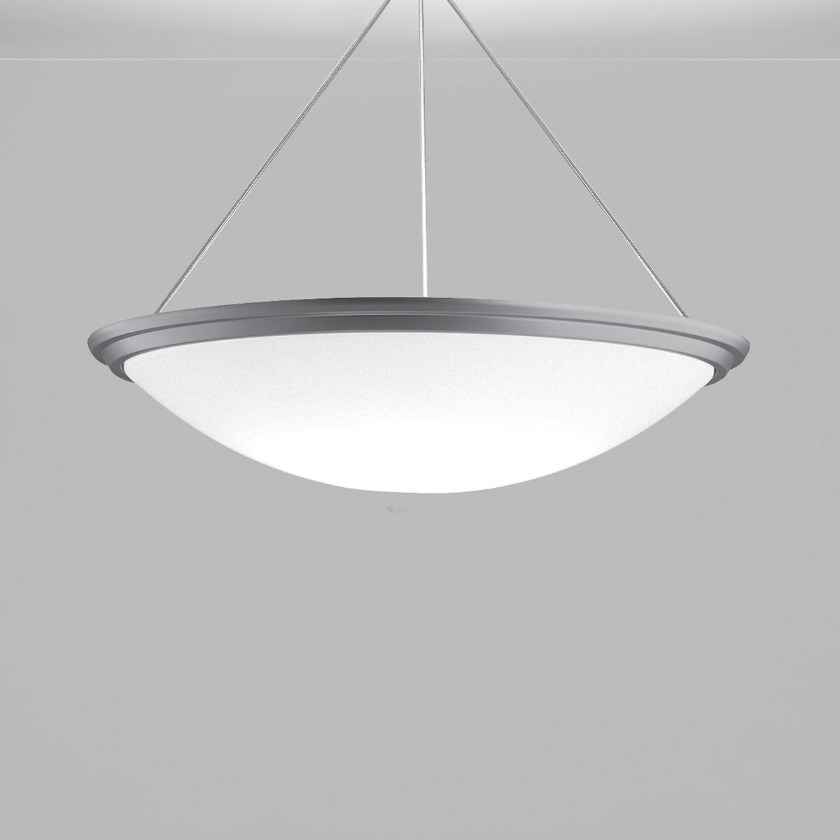 A large bowl pendant suspended with a cable