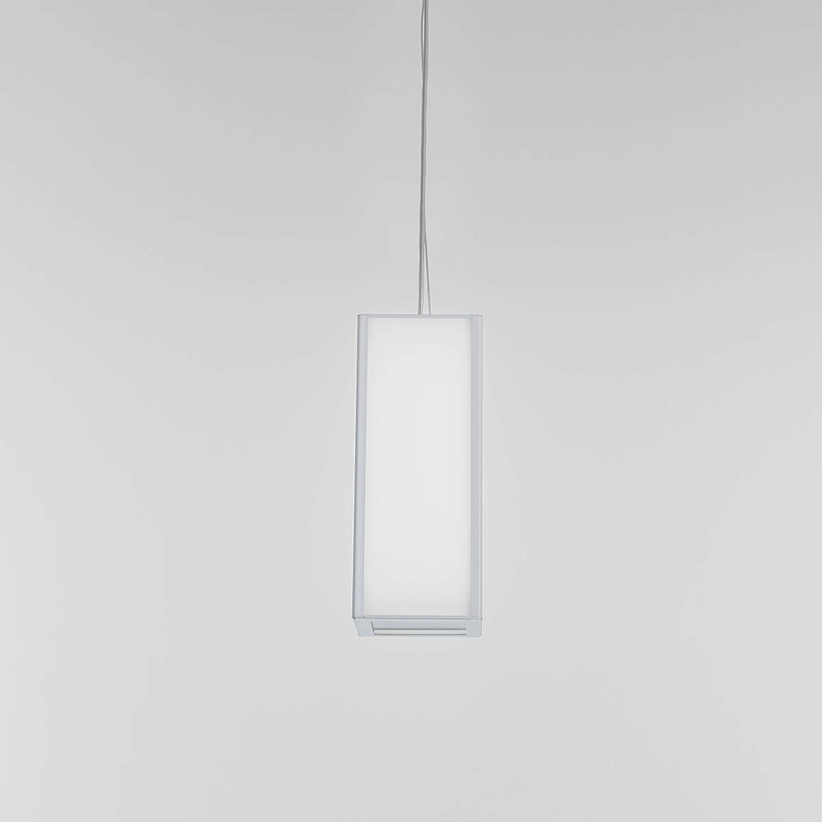 A large, rectangular pendant with a frame and luminous diffuser body 