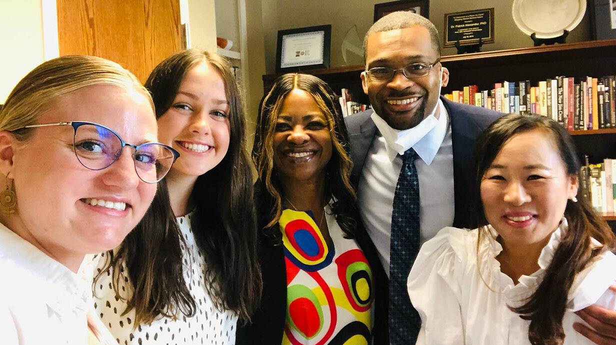 Among the people working on the UM Prison-to-College Pipeline Program team are (from left) Morgan McComb, teaching assistant; Anna Ruth Doddridge, intern; Tracion Flood, program manager; Patrick Alexander, co-founder and director; and Juyoun Jang, research fellow. Submitted photo