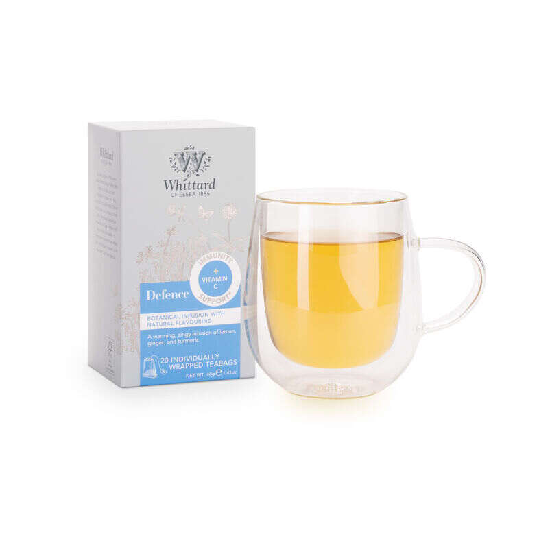 Defence Wellness Tea Packaging and Made up Drink on White Background