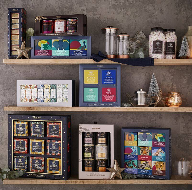 Range of gifts including World of Whittard next to Cocoa Creations and Coffees of the World on a shelf