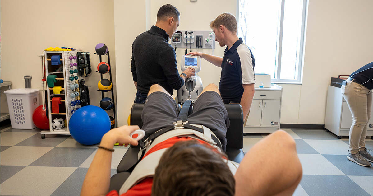Athletic Training Student working with professor