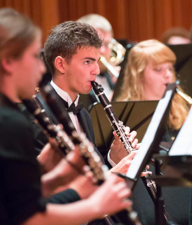 Clarinet symphony band performing on stage