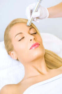 Lady getting treatment for the removal of dark spots