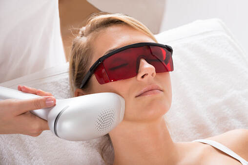 Woman getting treated with lasers for Laser skin rejuvenation