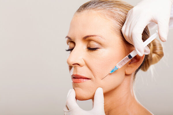 Women getting botox treatment for to improve appearence for long term