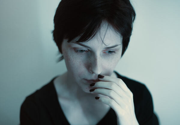 Women in depression and anxiety due to Rosacea
