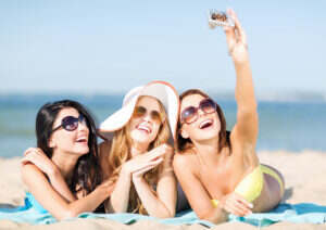 Ladies enjoying summer, taking sun bath