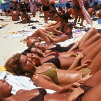 Why do suntans develop hours after we get home from the beach? A new study explains.